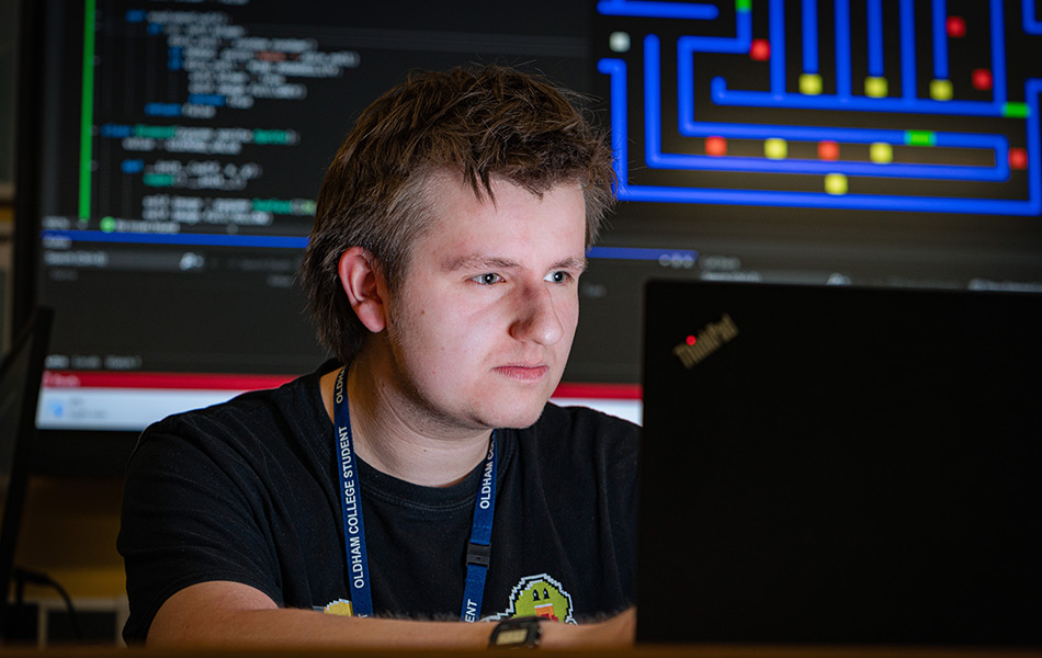 Young male working on digital coding