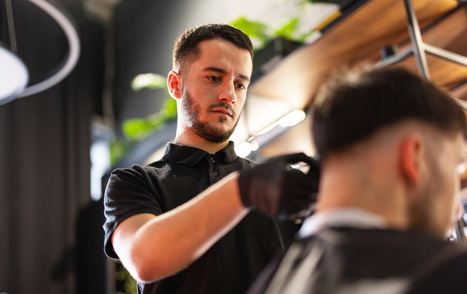 Male barber cutting hair